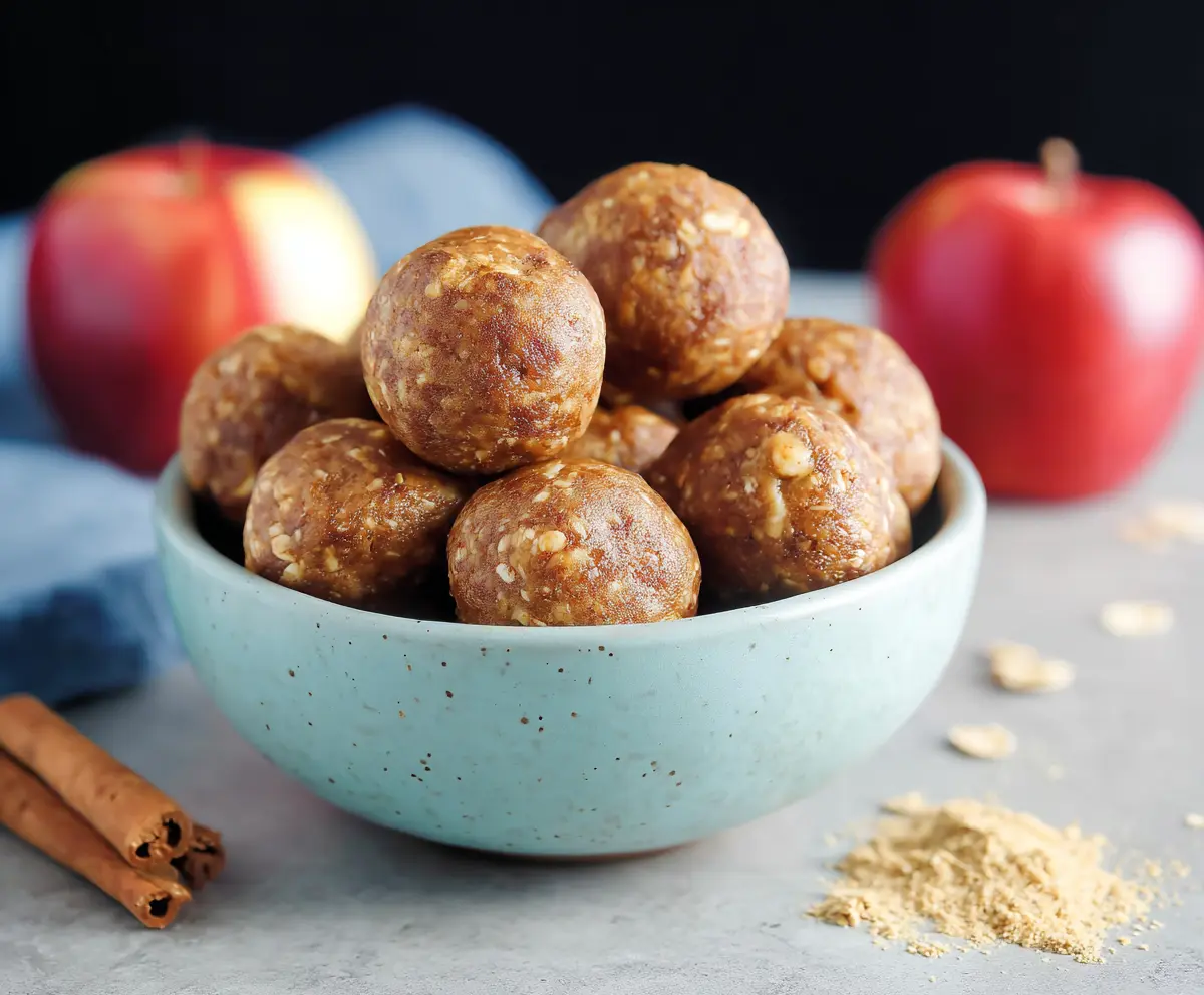 Delicious apple pie protein bites with crispy exterior and sweet apple filling, perfect for a healthy snack.