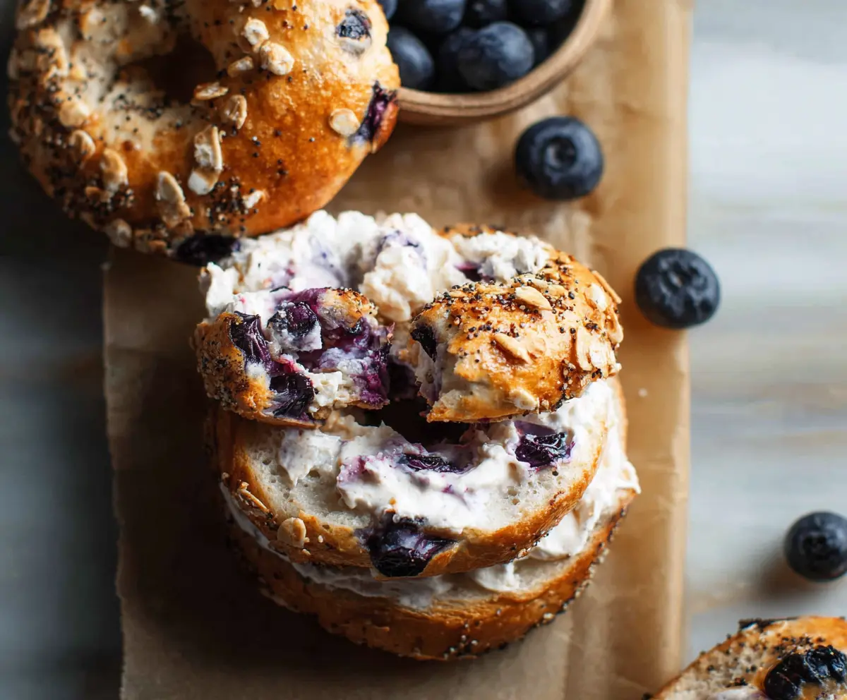 Greek yogurt blueberry crunch bagels on a plate, fresh and flavorful breakfast option.