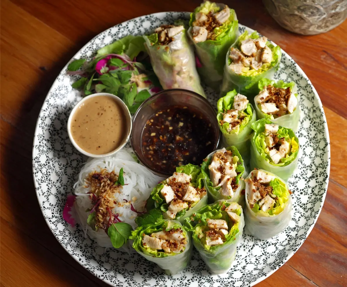 Delicious Caesar Chicken Rice Paper Rolls with fresh lettuce and creamy dressing